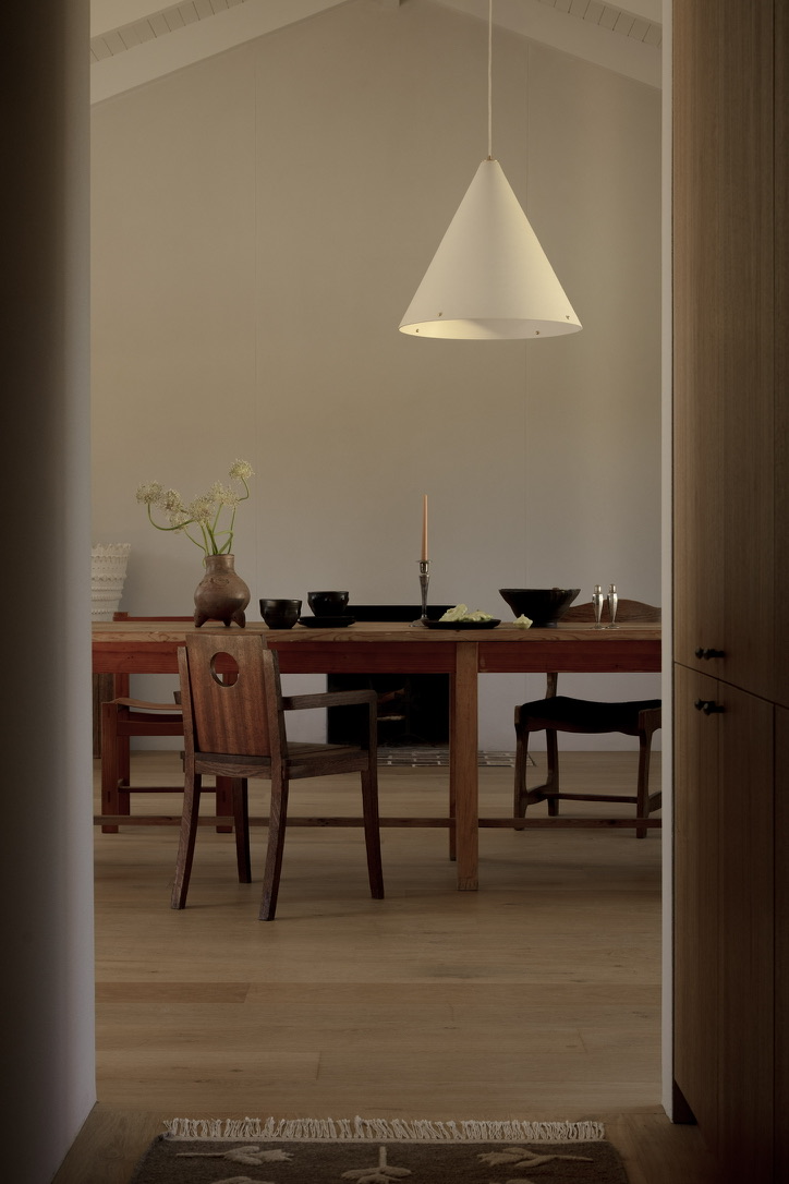 hanging lamp above a dining table